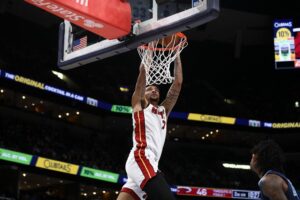 Kel'el Ware of the Miami Heat, one of our top NBA player props today, goes to the basket against the Memphis Grizzlies.