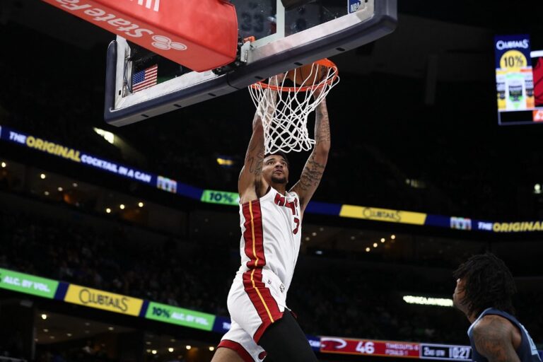 Kel'el Ware of the Miami Heat, one of our top NBA player props today, goes to the basket against the Memphis Grizzlies.