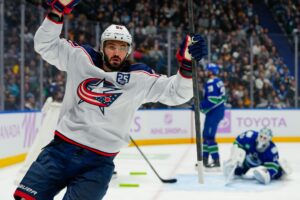 Kirill Marchenko of the Columbus Blue Jackets, one of our top picks for NHL anytime goal scorer props, celebrates after scoring a goal against the Vancouver Canucks.