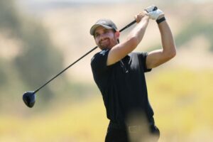 The cover for this Butterfield Bermuda Championship 2025 article shows Patrick Rodgers of of the United States hitting his tee shot on the sixth hole