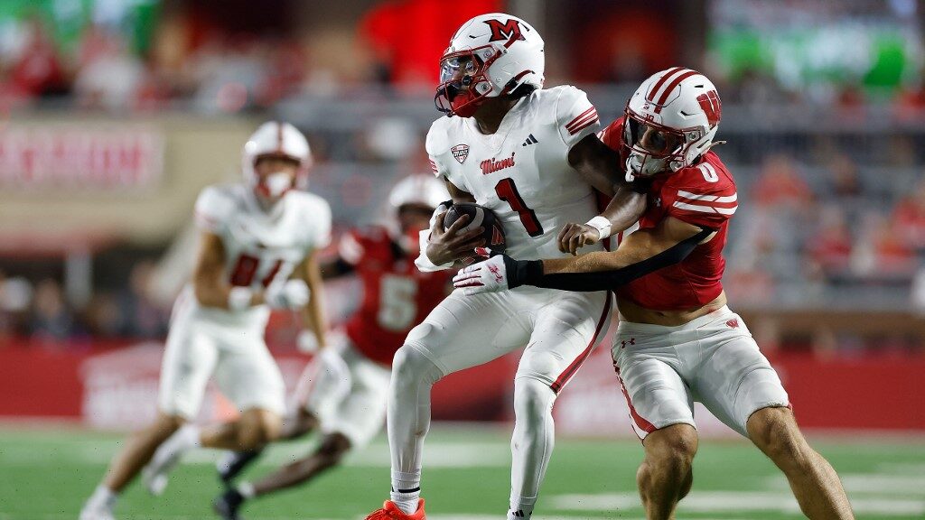 Christian-Alliegro-0-of-the-Wisconsin-Badgers-sacks-Dequan-Finn-aspect-ratio-16-9