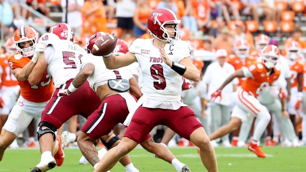 Goose-Crowder-9-of-the-Troy-Trojans-attempts-to-throw-a-pass-aspect-ratio-16-9