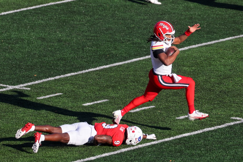 Malik Washington #7 of the Maryland Terrapins, featured in our College football odds week 13 preview, runs for a touchdown against the Rutgers Scarlet Knights.