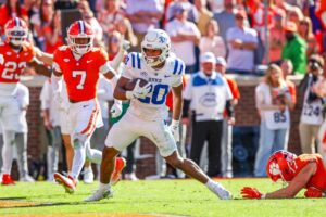 Nate Sheppard #20 of the Duke Blue Devils scores a touchdown during the second half of a football game against the Clemson Tigers.