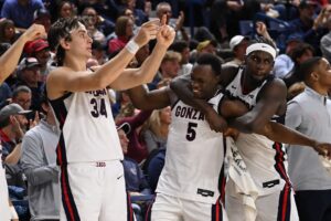 The Gonzaga Bulldogs, one of our College basketball picks today, celebrate a dunk against the Texas Southern Tigers.