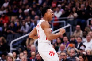 Scottie Barnes #4 of the Toronto Raptors reacts against the Golden State Warriors.