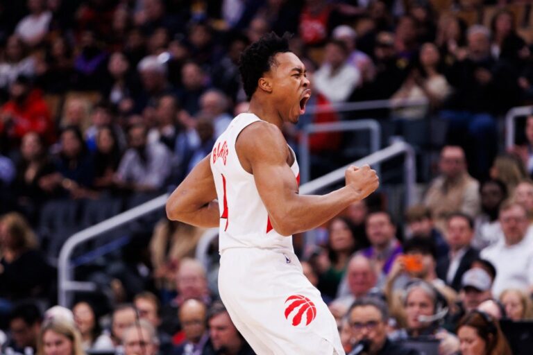 Scottie Barnes #4 of the Toronto Raptors reacts against the Golden State Warriors.