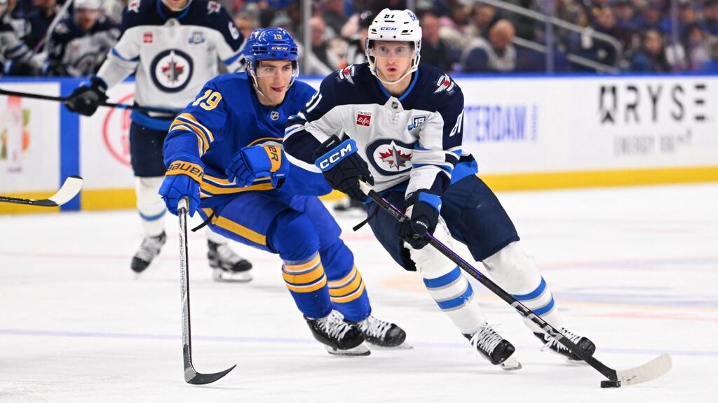 Kyle-Connor-81-of-the-Winnipeg-Jets-controls-the-puck-against-Peyton-Krebs-aspect-ratio-16-9