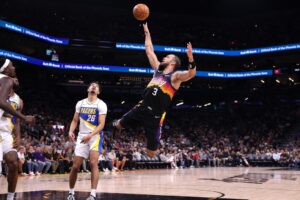 Dillon Brooks #3 of the Phoenix Suns shoots in the first half against the Indiana Pacers.