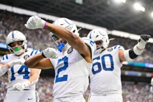 Josh Downs #2 of the Indianapolis Colts celebrates a touchdown reception against the Seattle Seahawks.