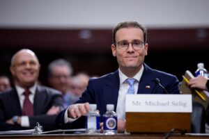 Michael Selig, President Donald Trump's nominee to lead the Commodity Futures Trading Commission (R), accompanied by former Chairman of Commodity Futures Trading Commission J. Christopher Giancarlo (L)