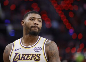 The cover for this NBA player props today article shows Marcus Smart #36 of the Los Angeles Lakers during play against the LA Clippers in the second half.