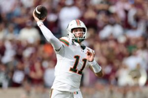 The cover for this College football playoffs player props article shows Carson Beck #11 of the Miami Hurricanes throwing a pass in the first half against the Texas A&M Aggies during the 2025 College Football Playoff First Round Game.