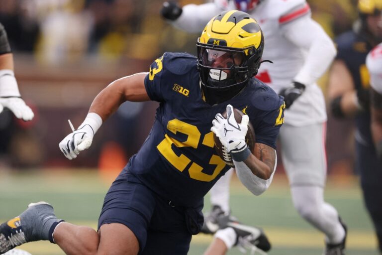Jordan Marshall #23 of the Michigan Wolverines plays against the Ohio State Buckeyes.