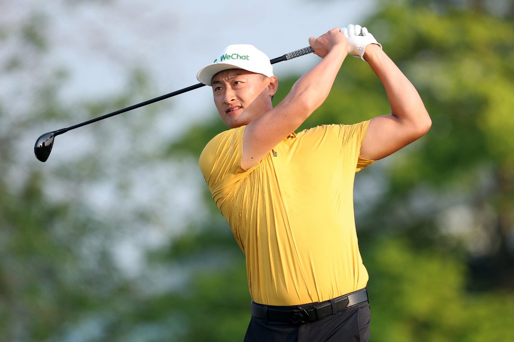 Haotong Li of China plays his shot from the tenth tee during the second round of the 3M Open 2025.