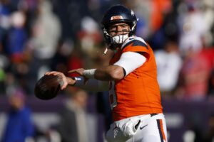 Jarrett Stidham #8 of the Denver Broncos warms up prior to the AFC Divisional Playoff game against the Buffalo Bills.