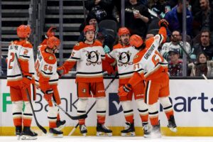 Chris Kreider #20 of the Anaheim Ducks celebrates his goal with teammates during the second period against the Seattle Kraken.