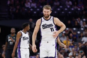 Domantas Sabonis #11 of the Sacramento Kings reacts after a play in the second quarter against the Minnesota Timberwolves.
