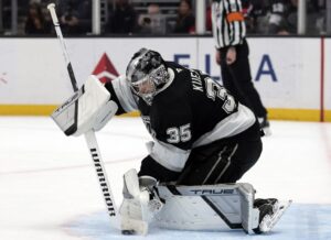 Darcy Kuemper #35 of the Los Angeles Kings at play against the Vegas Golden Knights.