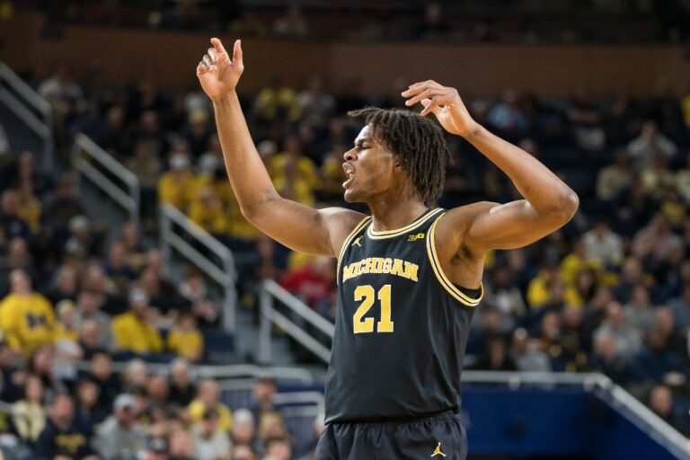 Morez Johnson Jr. #21 of the Michigan Wolverines reacts following a first-half play against the Nebraska Cornhuskers.