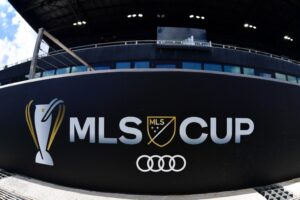 The cover for this industry news article shows the MLS Cup logo seen prior to the Audi 2025 MLS Cup Final match between Inter Miami CF and Vancouver Whitecaps FC.