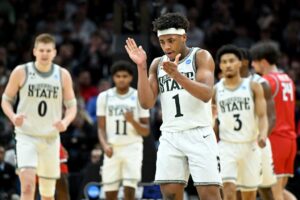 Jeremy Fears Jr. #1 of the Michigan State Spartans celebrates a basket against the New Mexico Lobos.