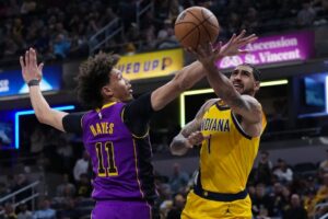 Obi Toppin #1 of the Indiana Pacers attempts a shot while being guarded by Jaxson Hayes #11 of the Los Angeles Lakers